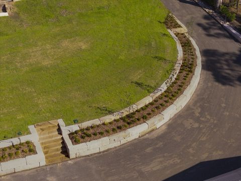 Kenthurst site cut and two-tier sandstone retaining wall
