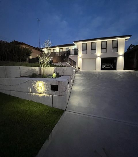 Illuminated sandstone wall at night