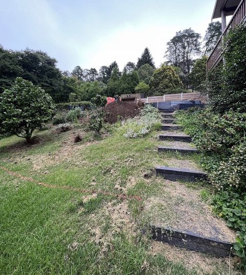 Grassy sloping paddock before site preparation, Penrith NSW